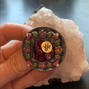 Upcycled whimsical statement adjustable ring made from a watch face.